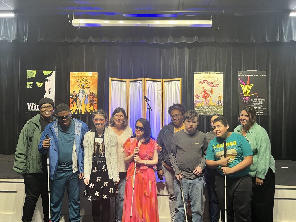 Mary Mikels with 150 GCSD students