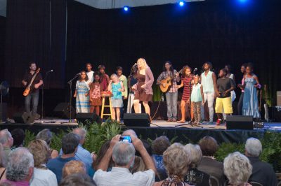 Elise Testone sings with students from Teach My People