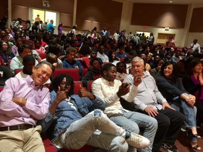Board member, Dan Adams, enjoys time with Carvers Bay High School students during a workshop presented by We’ve Only Just Begun: A Carpenters Experience.